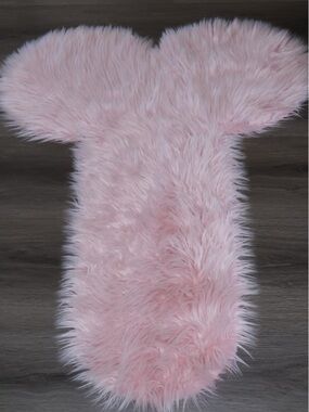 pink phallic-shaped accent rug. Novelty gift